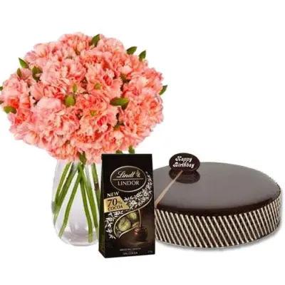 Mud Cake With Pink Carnations And Lindt Chocolates